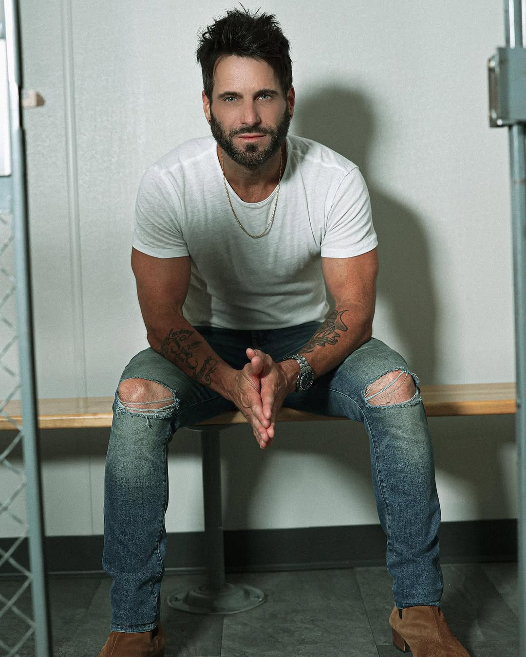 Greyson Distressed Slim Fit Jeans